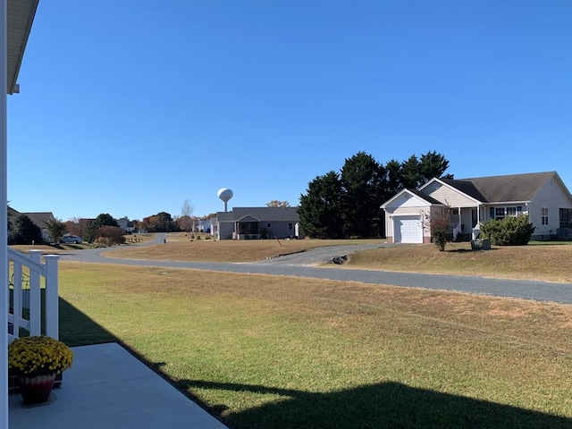 view of yard with a garage