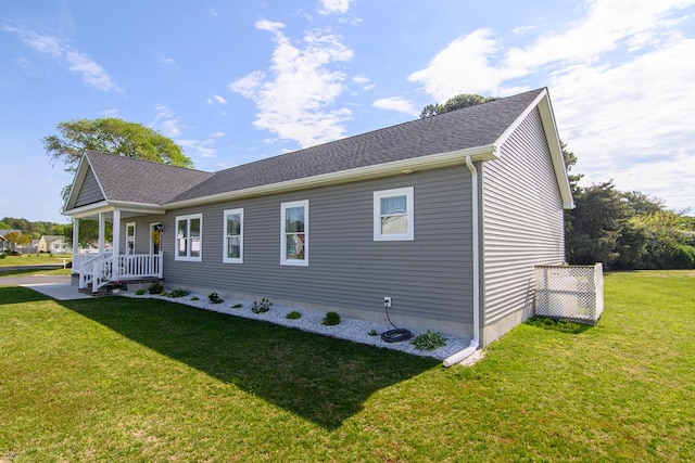 2265 Yardarm Dr, Greenbackville, VA 23356 - exterior space featuring covered porch and a front yard