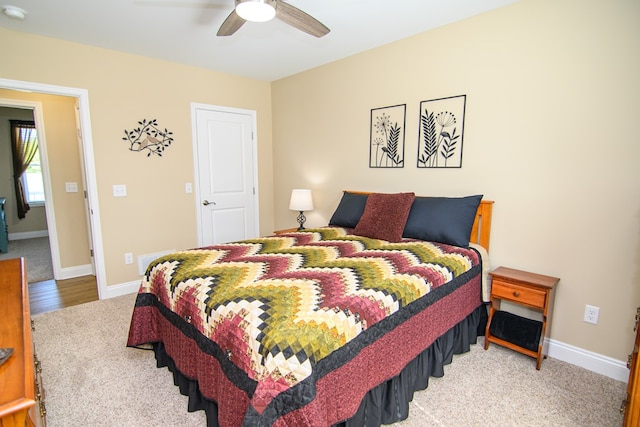 2265 Yardarm Dr, Greenbackville, VA 23356 - carpeted bedroom with baseboards and a ceiling fan