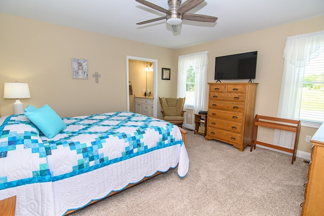 2265 Yardarm Dr, Greenbackville, VA 23356 - bedroom featuring carpet floors, a ceiling fan, baseboards, and ensuite bathroom