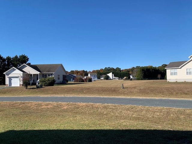 view of yard featuring a garage