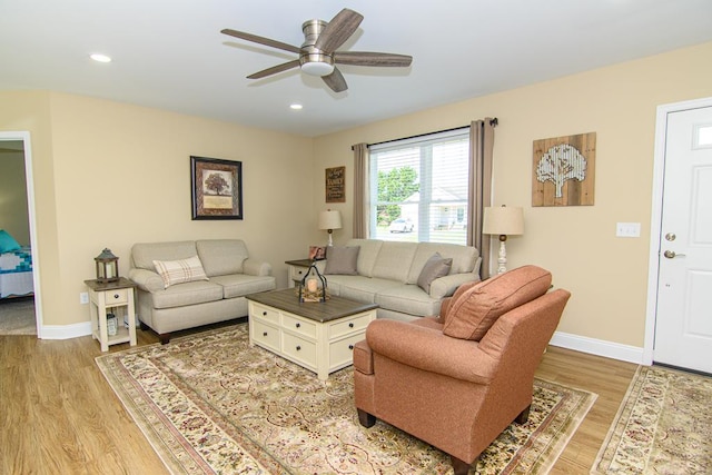2265 Yardarm Dr, Greenbackville, VA 23356 - living room with light wood-style floors, recessed lighting, baseboards, and ceiling fan