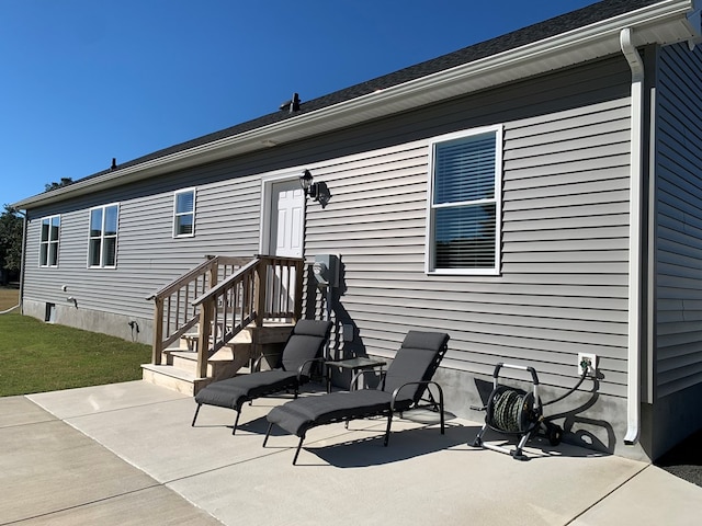 back of house featuring a patio area