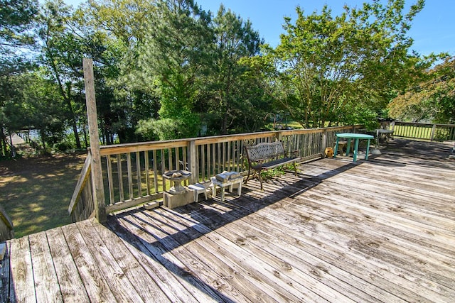 24324 Adams Hill Dr, Accomac, VA 23301 - wooden terrace featuring view of scattered trees