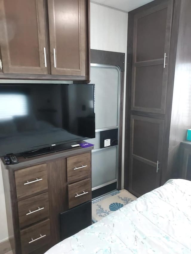 kitchen with dark brown cabinets