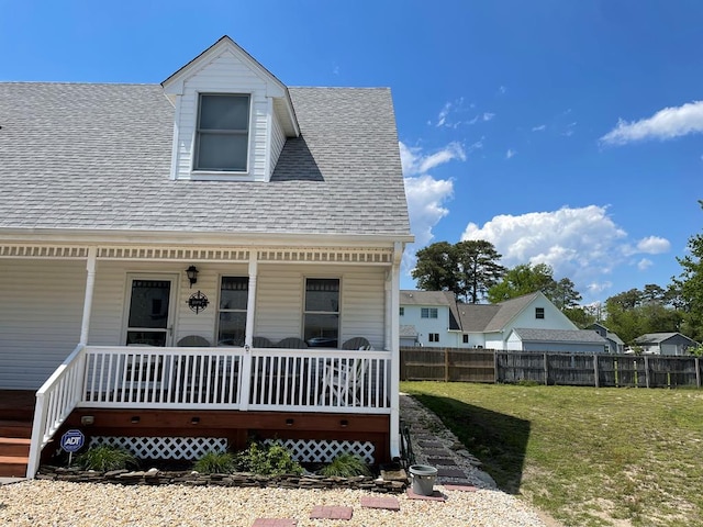 4097 Grand Bay Ct, Chincoteague, VA 23336 - view of front facade with covered porch and roof with shingles