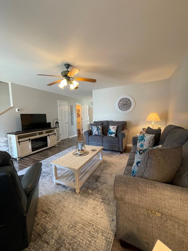 4097 Grand Bay Ct, Chincoteague, VA 23336 - living room with ceiling fan, wood finished floors, and baseboards