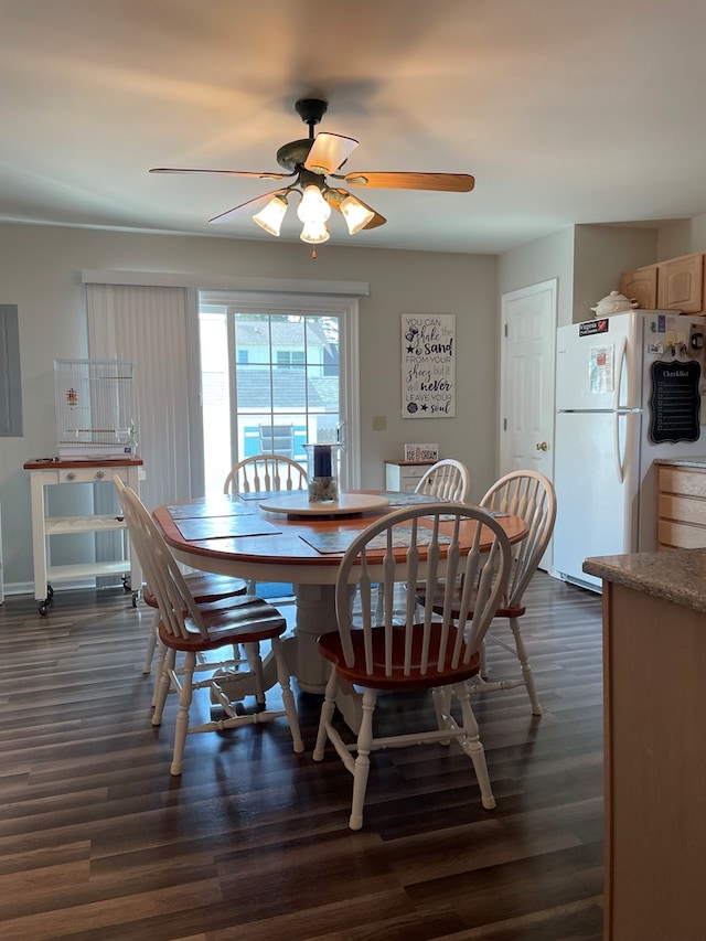 4097 Grand Bay Ct, Chincoteague, VA 23336 - dining room with ceiling fan and dark wood finished floors
