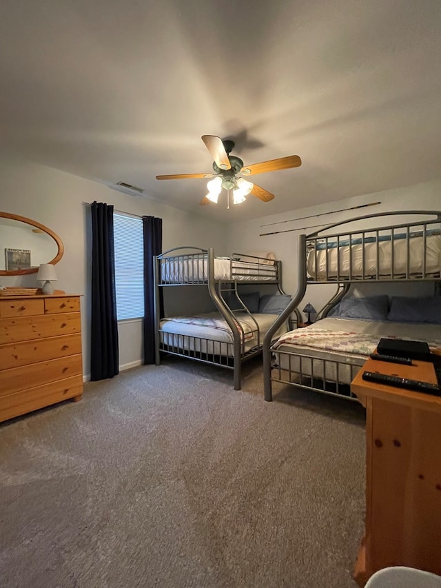 4097 Grand Bay Ct, Chincoteague, VA 23336 - carpeted bedroom featuring a ceiling fan