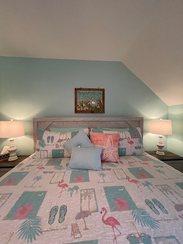 4097 Grand Bay Ct, Chincoteague, VA 23336 - bedroom featuring vaulted ceiling