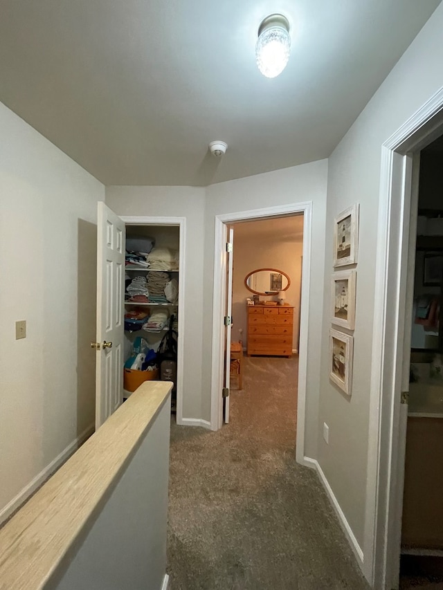 4097 Grand Bay Ct, Chincoteague, VA 23336 - hall featuring dark carpet and baseboards