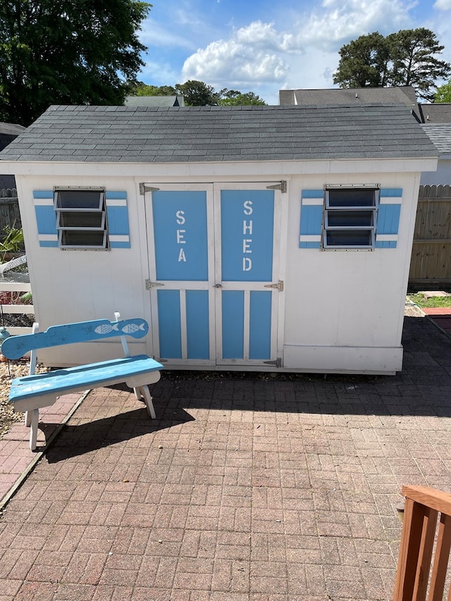 4097 Grand Bay Ct, Chincoteague, VA 23336 - view of shed with fence