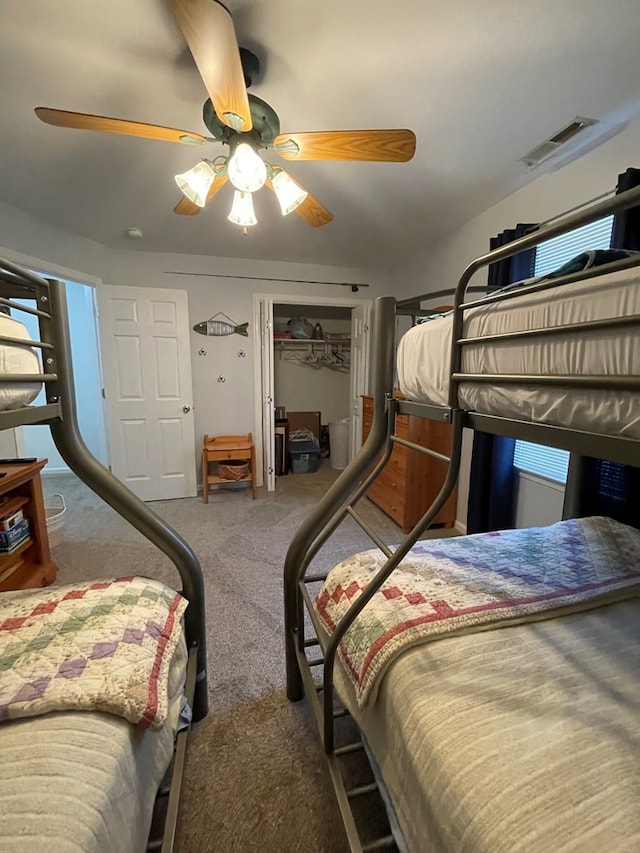 4097 Grand Bay Ct, Chincoteague, VA 23336 - carpeted bedroom featuring a ceiling fan and a closet