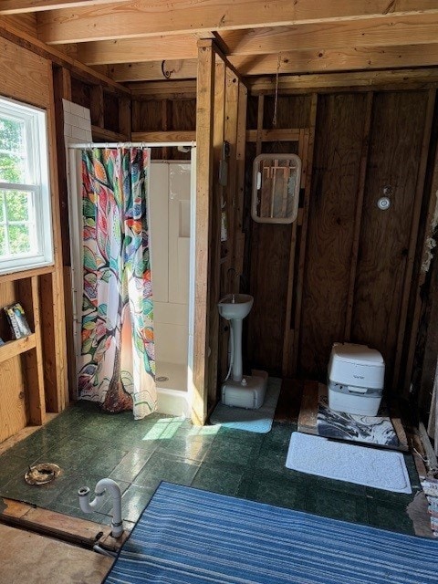 bathroom featuring walk in shower