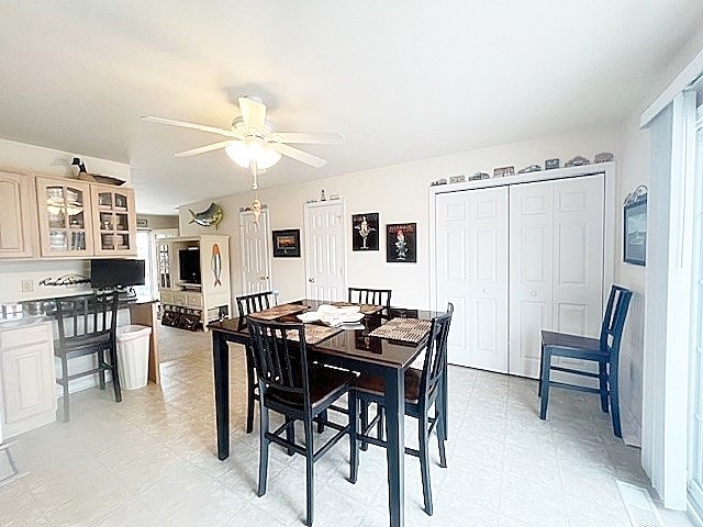 dining room featuring a ceiling fan