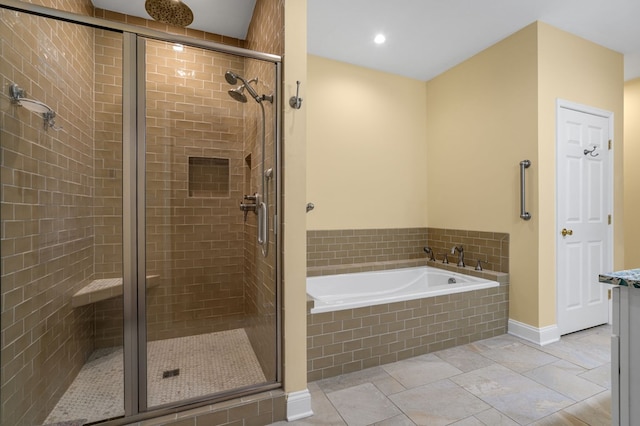 3315 Seaside Rd, Exmore, VA 23350 - full bath featuring a stall shower, a bath, baseboards, and recessed lighting
