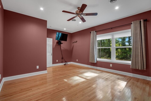 3315 Seaside Rd, Exmore, VA 23350 - unfurnished room featuring light wood-style floors, ceiling fan, baseboards, and recessed lighting