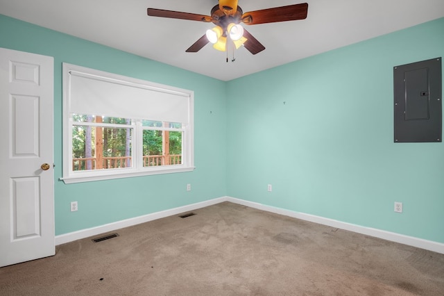 3315 Seaside Rd, Exmore, VA 23350 - carpeted empty room featuring electric panel, baseboards, and ceiling fan