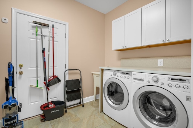 3315 Seaside Rd, Exmore, VA 23350 - washroom featuring cabinet space, separate washer and dryer, and baseboards