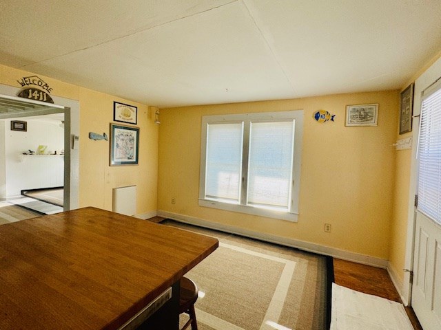 unfurnished dining area with a healthy amount of sunlight