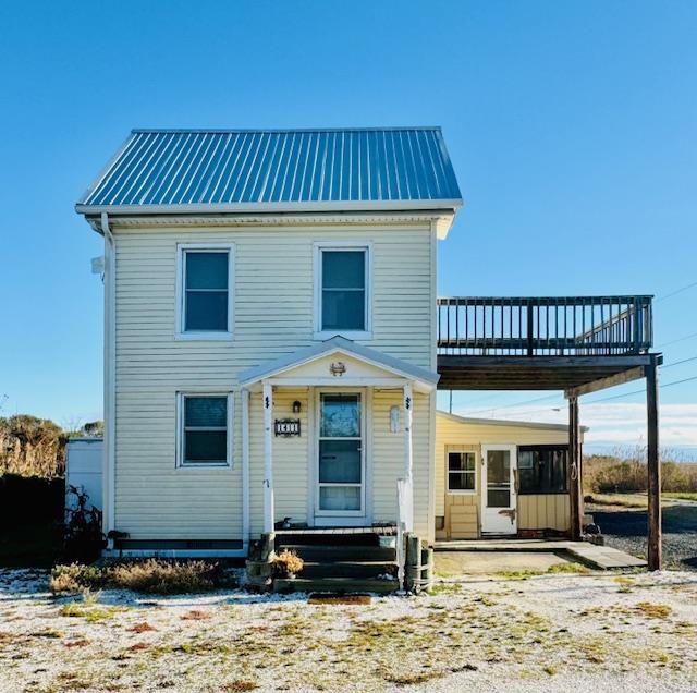 view of front of home with a deck