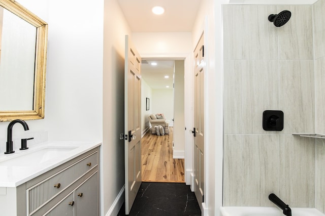 24455 Guilford Rd, Bloxom, VA 23308 - bathroom with vanity, recessed lighting, shower / washtub combination, and baseboards