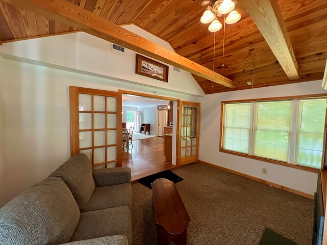 carpeted living room with beam ceiling, french doors, high vaulted ceiling, and wood ceiling