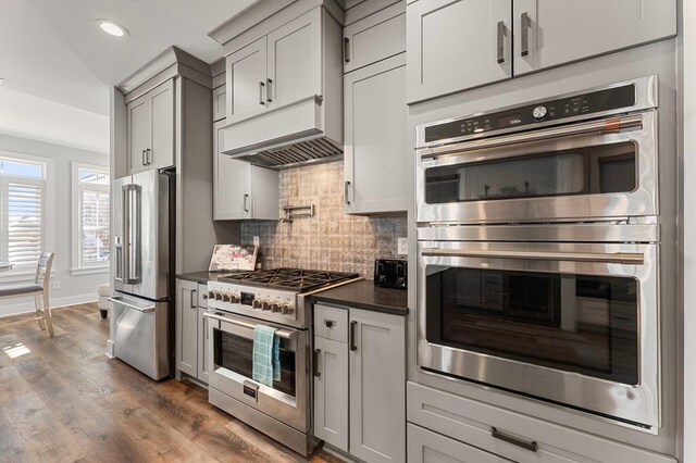 kitchen featuring wine cooler, stainless steel dishwasher, gray cabinetry, and sink