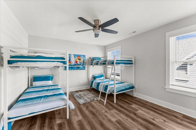 bedroom featuring ceiling fan and wood-type flooring