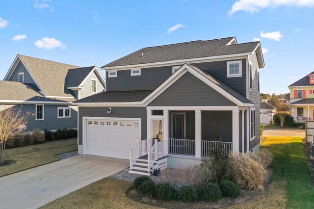 view of front facade with a porch, cooling unit, and a front yard