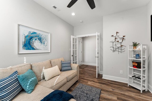 living room featuring hardwood / wood-style flooring and ceiling fan