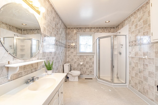 24103 Adelaide St, Parksley, VA 23421 - bathroom with tile walls, vanity, and a shower stall