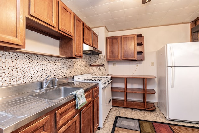 24103 Adelaide St, Parksley, VA 23421 - kitchen featuring white appliances, open shelves, brown cabinetry, under cabinet range hood, and backsplash