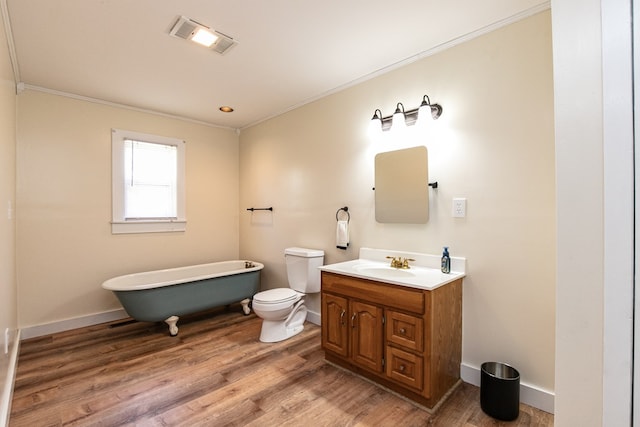 24103 Adelaide St, Parksley, VA 23421 - full bathroom with ornamental molding, a soaking tub, vanity, and wood finished floors