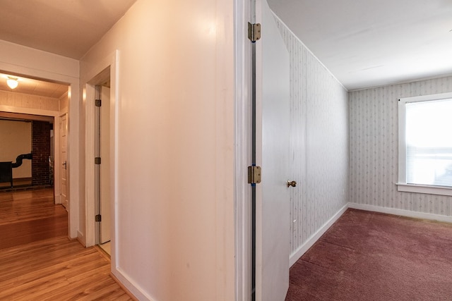 24103 Adelaide St, Parksley, VA 23421 - corridor featuring light wood finished floors and wallpapered walls