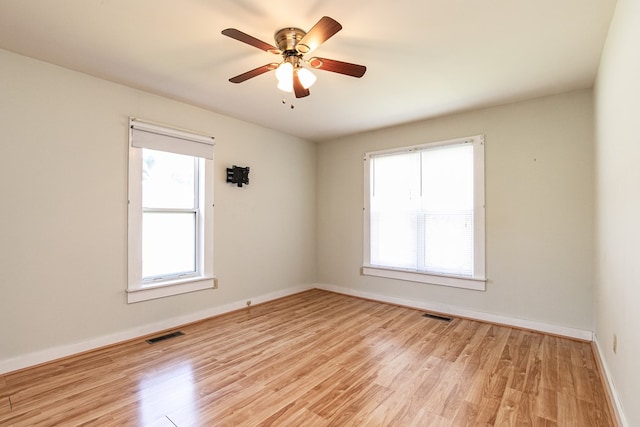 24103 Adelaide St, Parksley, VA 23421 - spare room featuring light wood-style flooring and ceiling fan