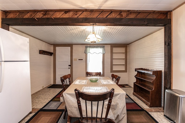 24103 Adelaide St, Parksley, VA 23421 - dining room with wood walls and beam ceiling