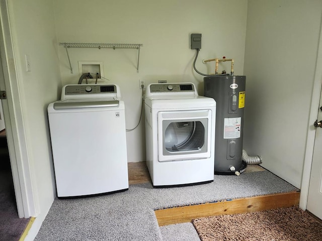 4068 Ridge Rd, Chincoteague, VA 23336 - washroom featuring water heater, washing machine and clothes dryer, and carpet