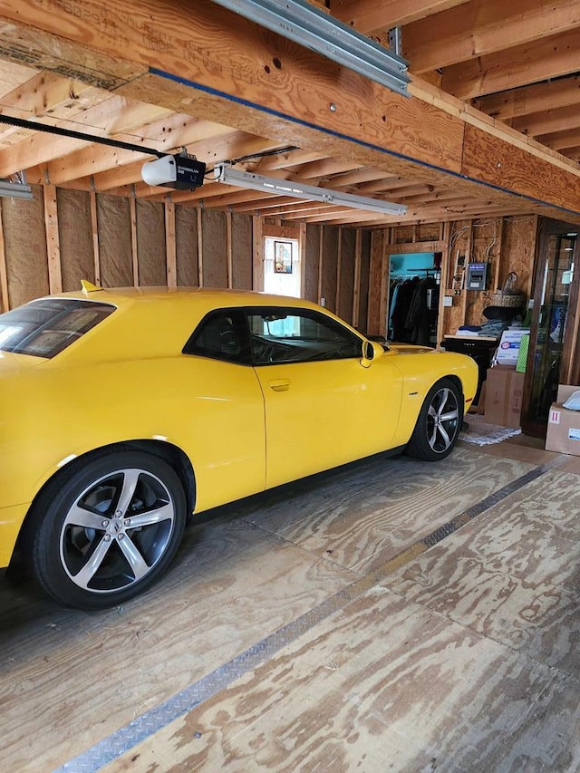 garage featuring a garage door opener