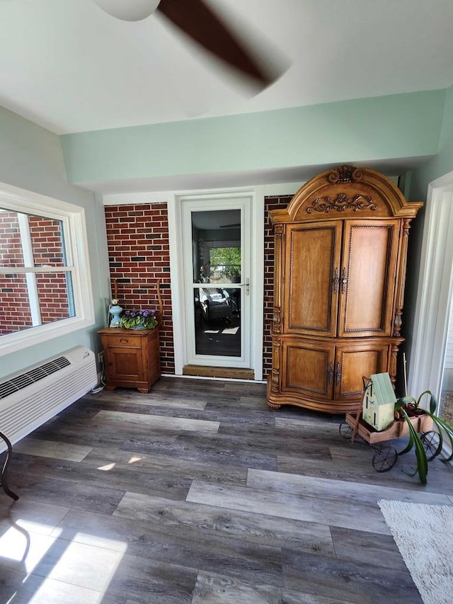 doorway to property with a wall unit AC