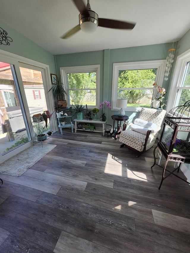 sunroom / solarium with a wealth of natural light and ceiling fan