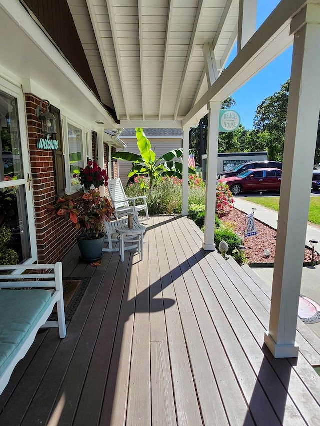 deck featuring covered porch