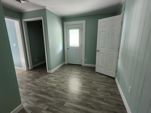 4068 Ridge Rd, Chincoteague, VA 23336 - foyer entrance with ornamental molding, dark wood finished floors, and baseboards
