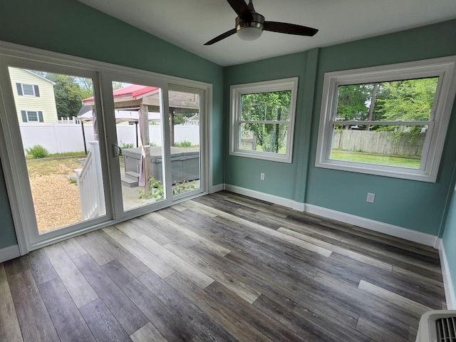 4068 Ridge Rd, Chincoteague, VA 23336 - empty room featuring healthy amount of natural light, wood finished floors, vaulted ceiling, and ceiling fan
