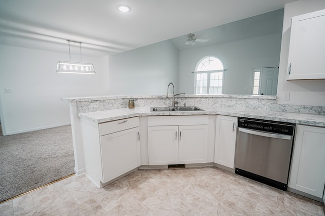 kitchen with pendant lighting, a sink, light stone countertops, dishwasher, and a peninsula