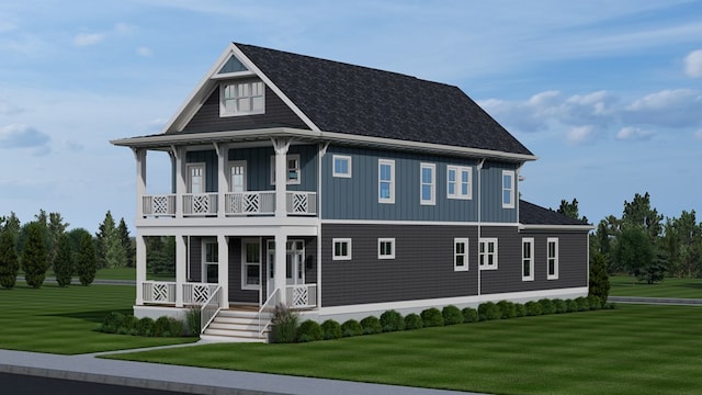 view of front facade with a front yard, a balcony, and covered porch