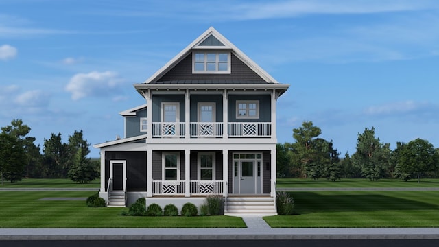 view of front of property with a front lawn, a balcony, and a porch