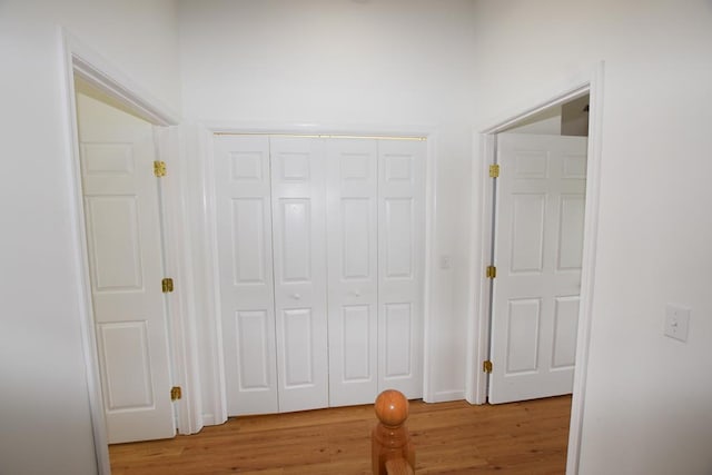 corridor featuring light hardwood / wood-style flooring