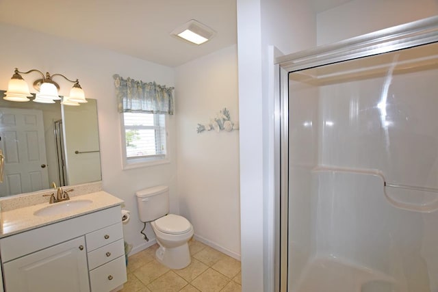 bathroom with tile patterned floors, vanity, toilet, and walk in shower