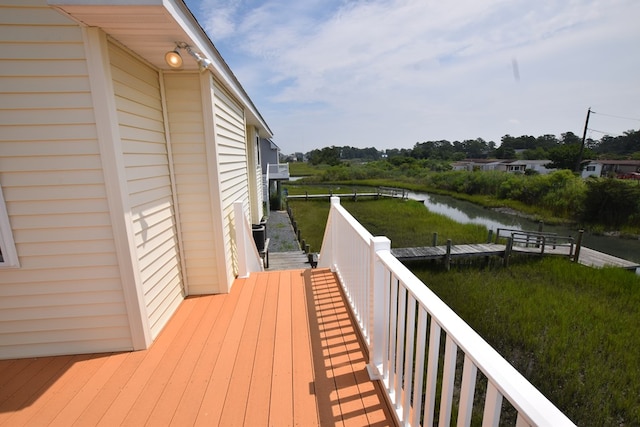 deck featuring a water view